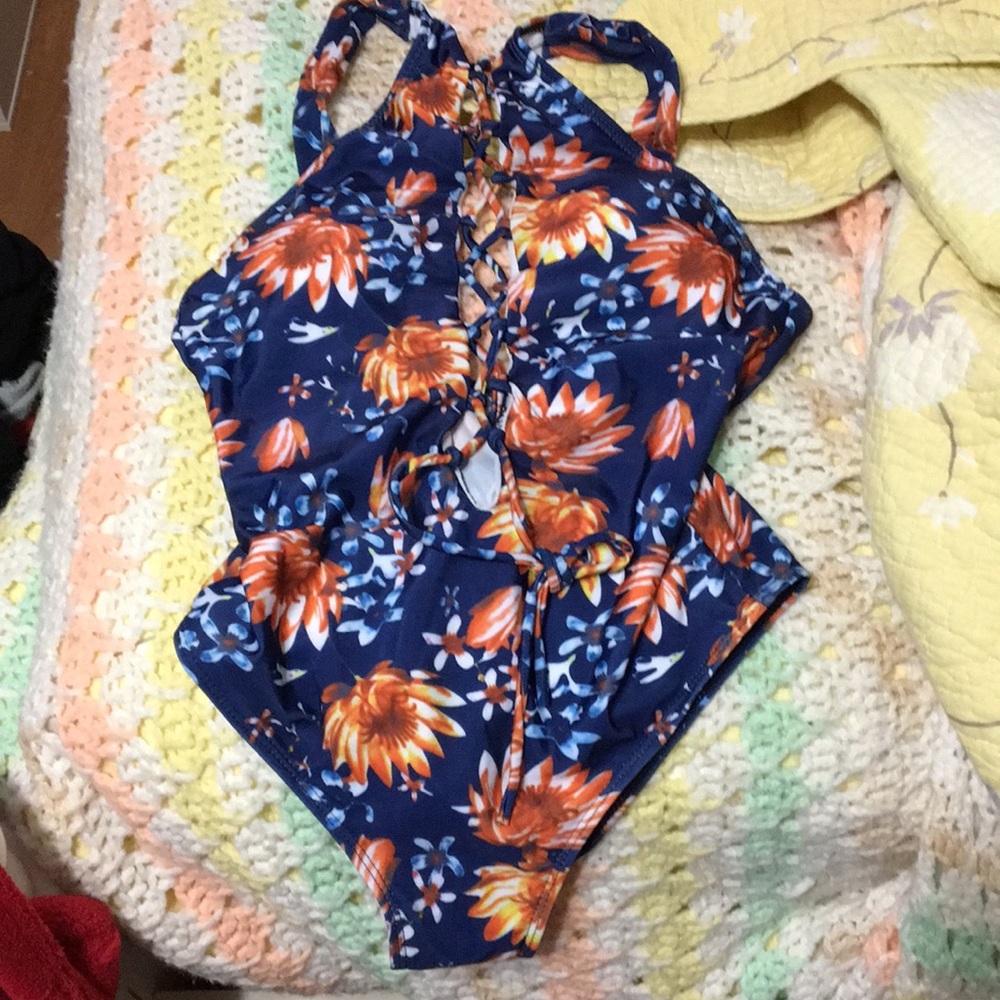 One piece lace up bathing suit